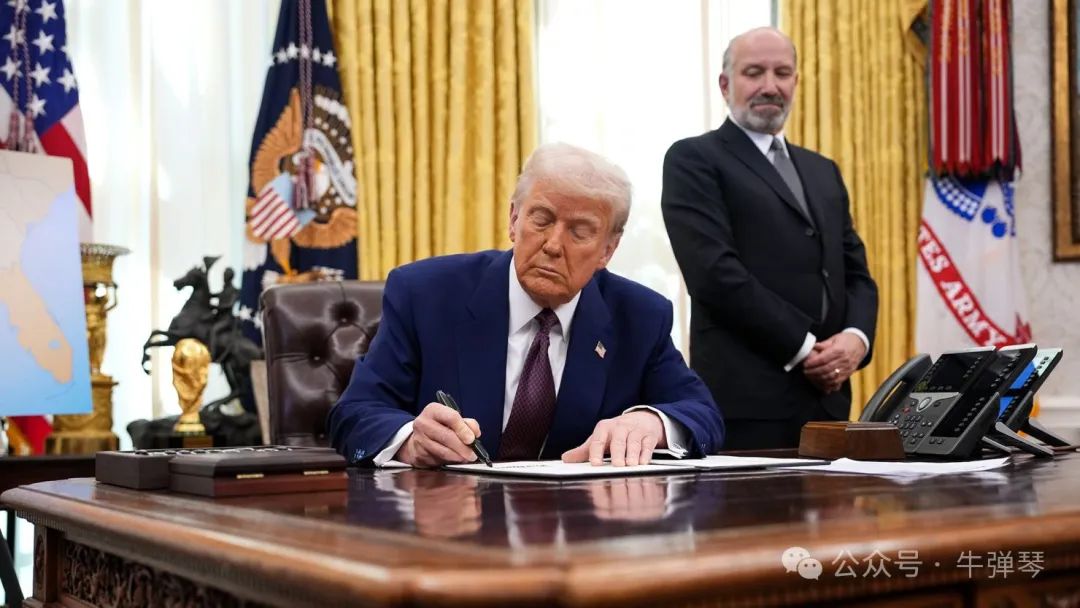 President Donald Trump signs an executive order on reciprocal tariffs in the Oval Office at the White House on February 13.