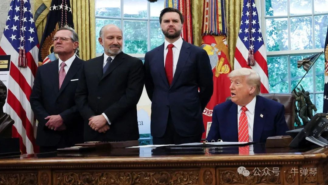 President Donald Trump is flanked by aides as he makes an announcement about a trade deal with the UK in the Oval Office at the White House in Washington, DC, on May 8.
