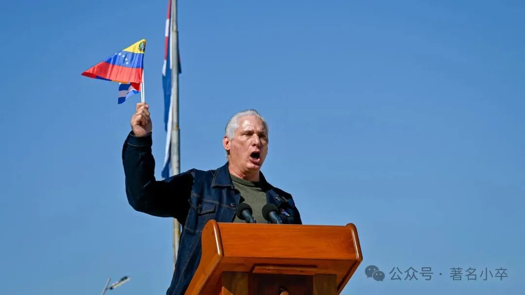 Cuba's President Miguel Diaz-Canel delivers a speech as he flutters a Venezuelan national flag in support of Venezuelan leader Nicolas Maduro in Havana on January 3, 2026, after US forces captured him. President Donald Trump said Saturday that US forces had captured Venezuela's leader Nicolas Maduro after bombing the capital Caracas and other cities in a dramatic climax to a months-long standoff between Trump and his Venezuelan arch-foe. (Photo by ADALBERTO ROQUE / AFP via Getty Images)